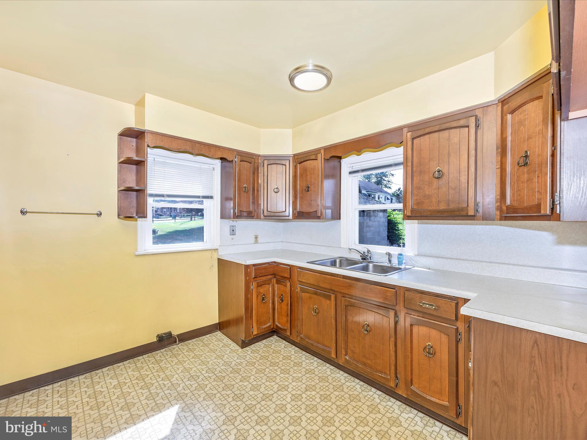 6 Park View Boonsboro, MD 21713 - Photo 15 of 64 a kitchen with a sink stove and cabinets