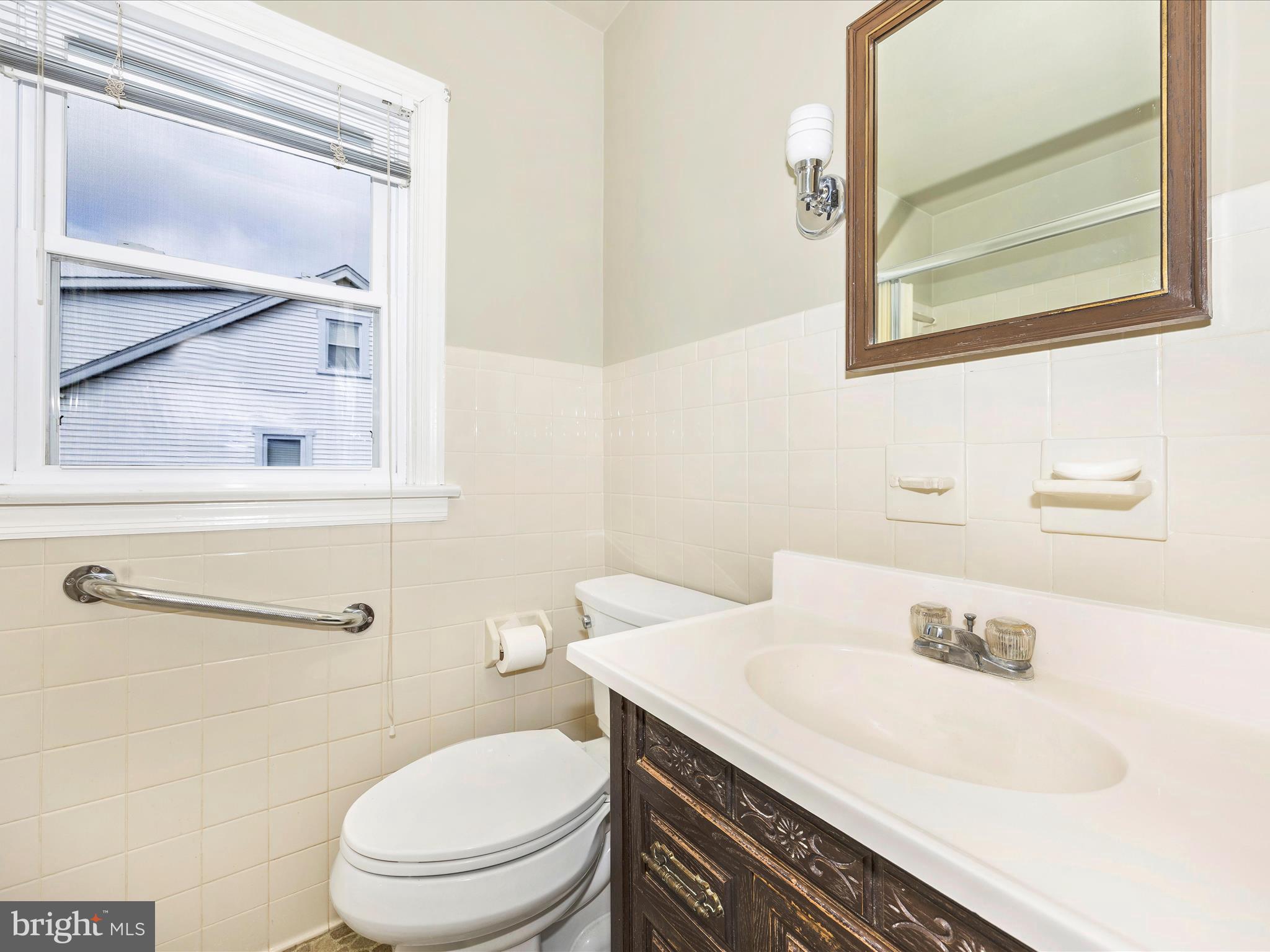 6 Park View Boonsboro, MD 21713 - Photo 27 of 64 a bathroom with a sink a toilet and a mirror