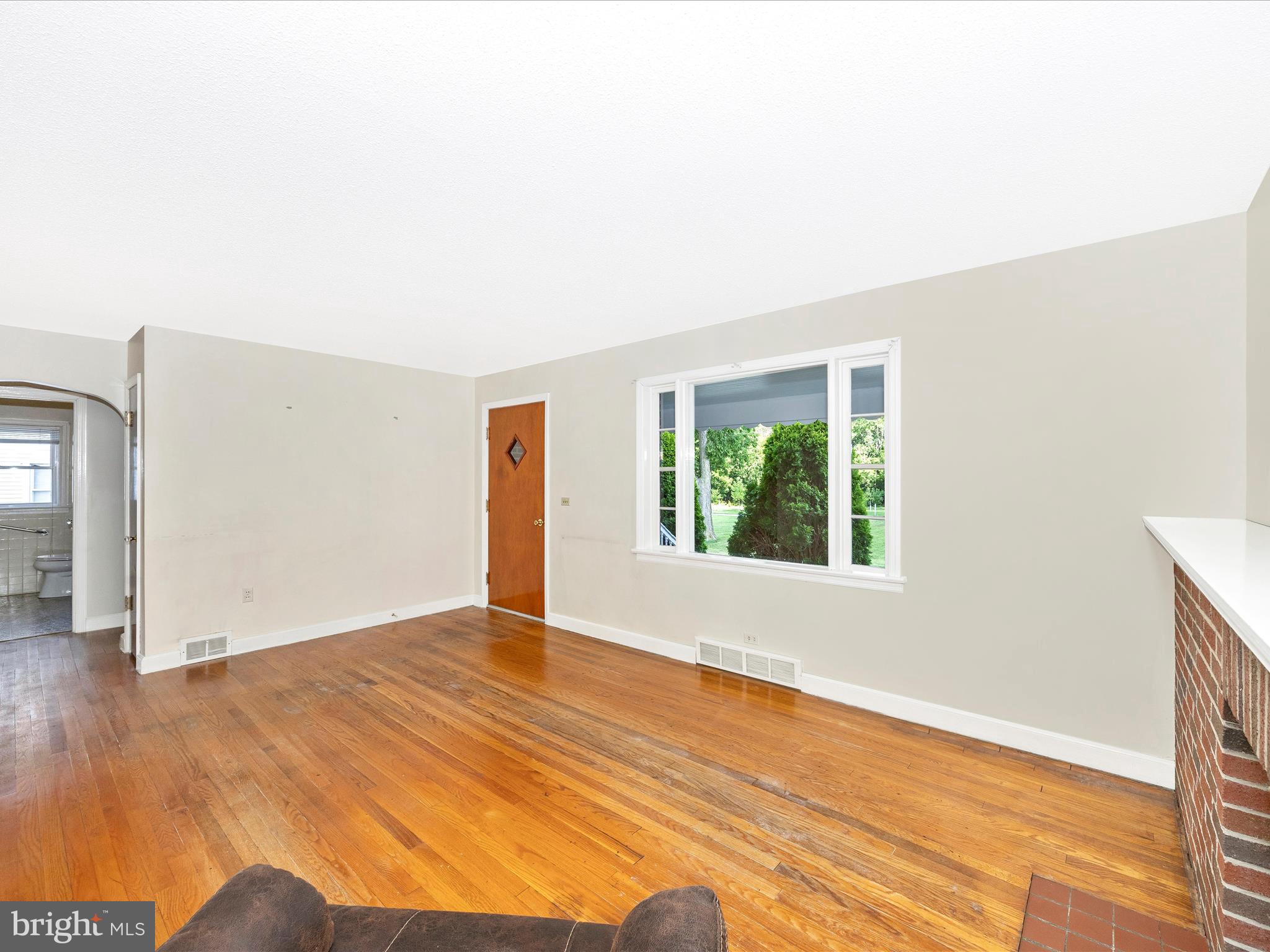 6 Park View Boonsboro, MD 21713 - Photo 4 of 64 an empty room with wooden floor and windows