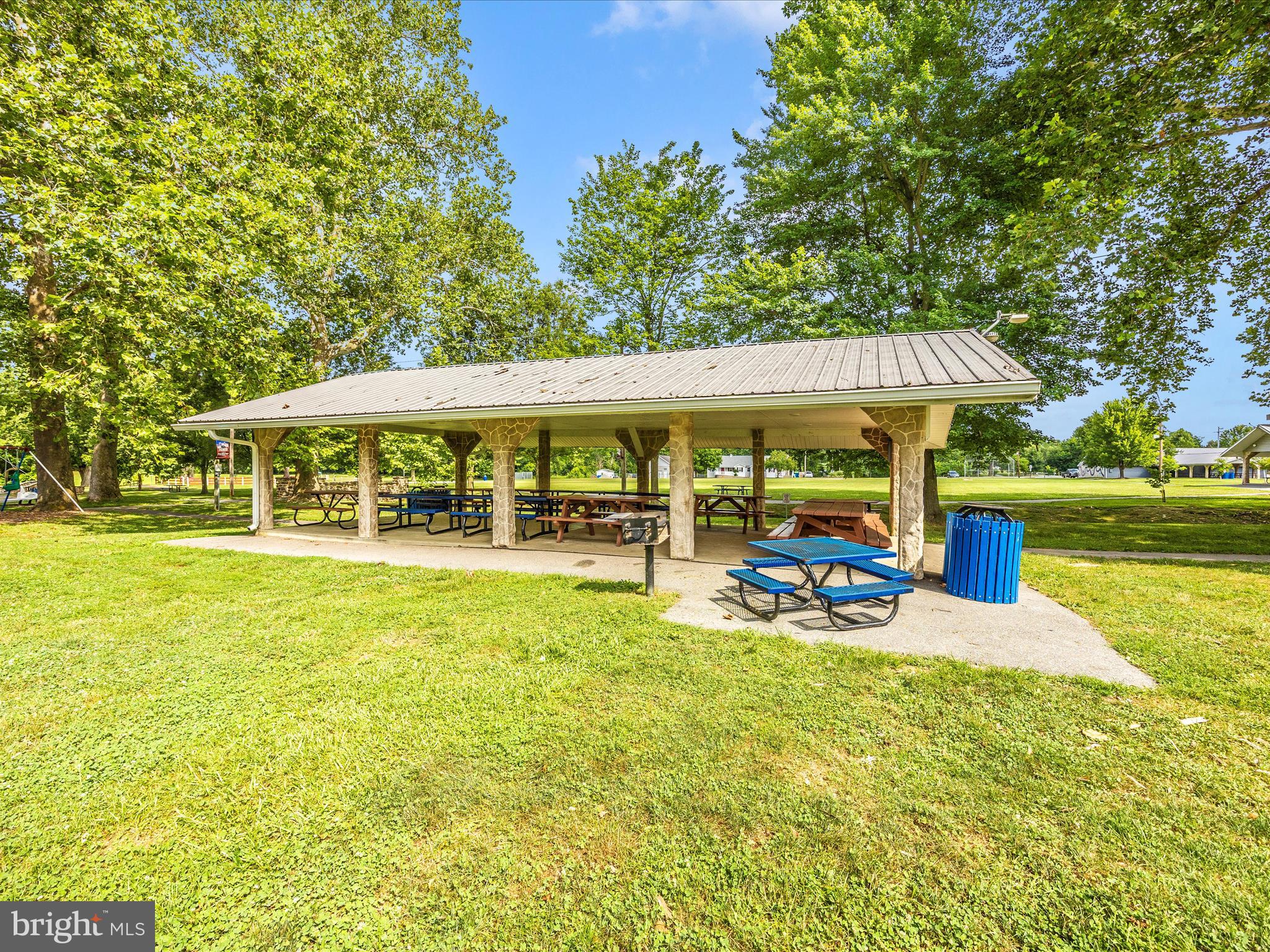 6 Park View Boonsboro, MD 21713 - Photo 61 of 64 a view of a swimming pool with lawn chairs under an umbrella