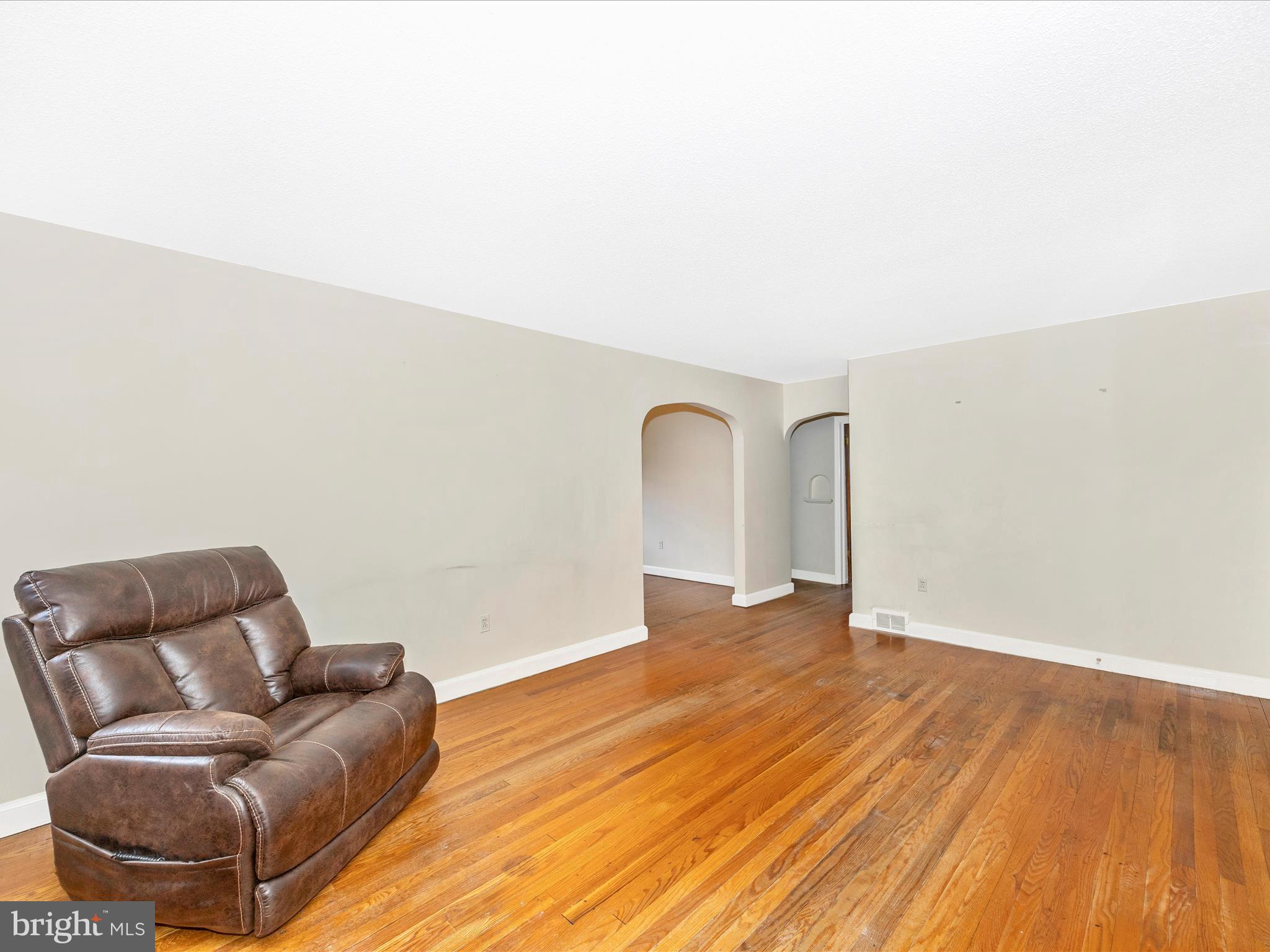 6 Park View Boonsboro, MD 21713 - Photo 7 of 64 a view of a livingroom with wooden floor and a couch