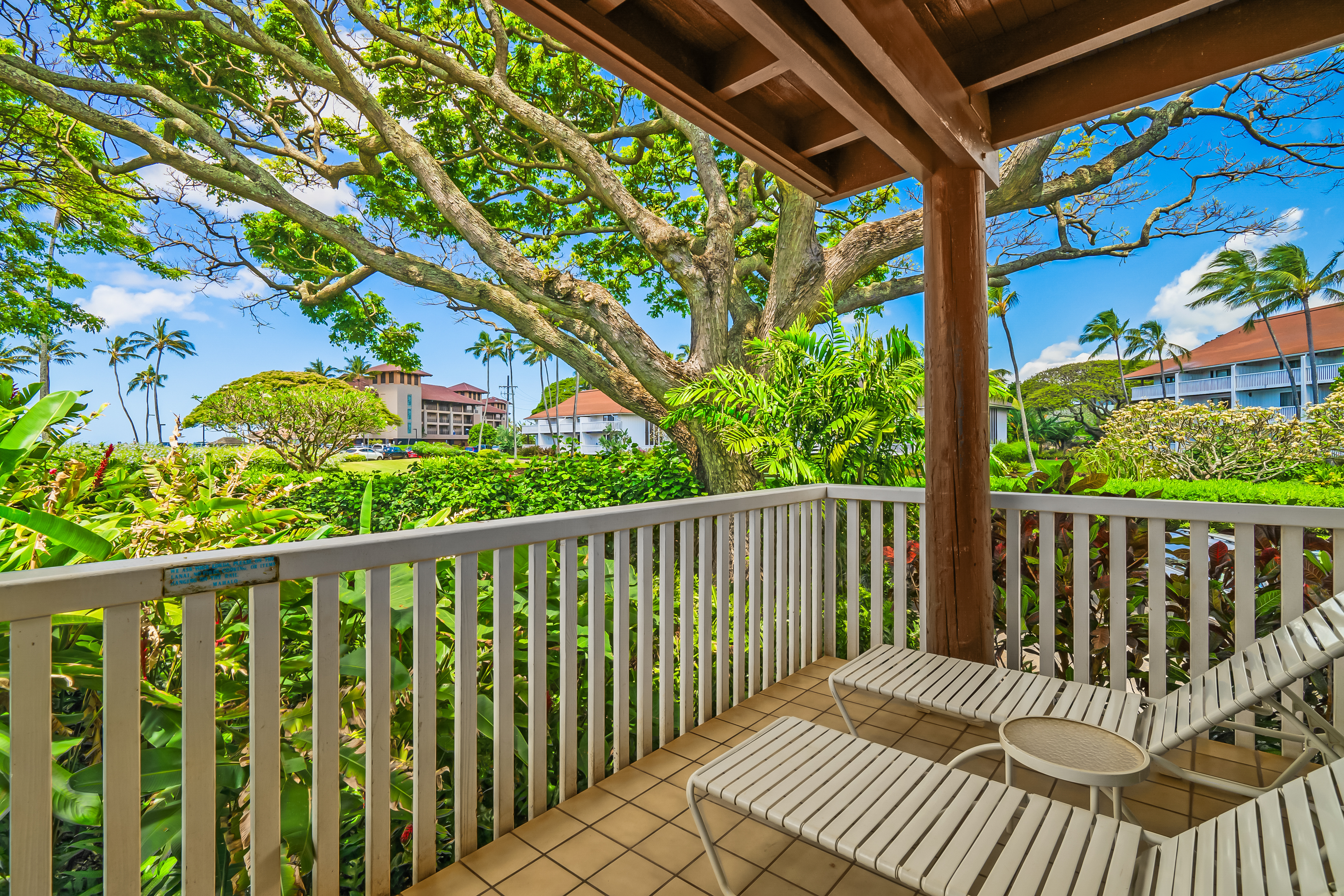 2253 Poipu Road, Unit 169 Koloa, HI 96756 - Photo 12 of 13 a view of a balcony with wooden floor