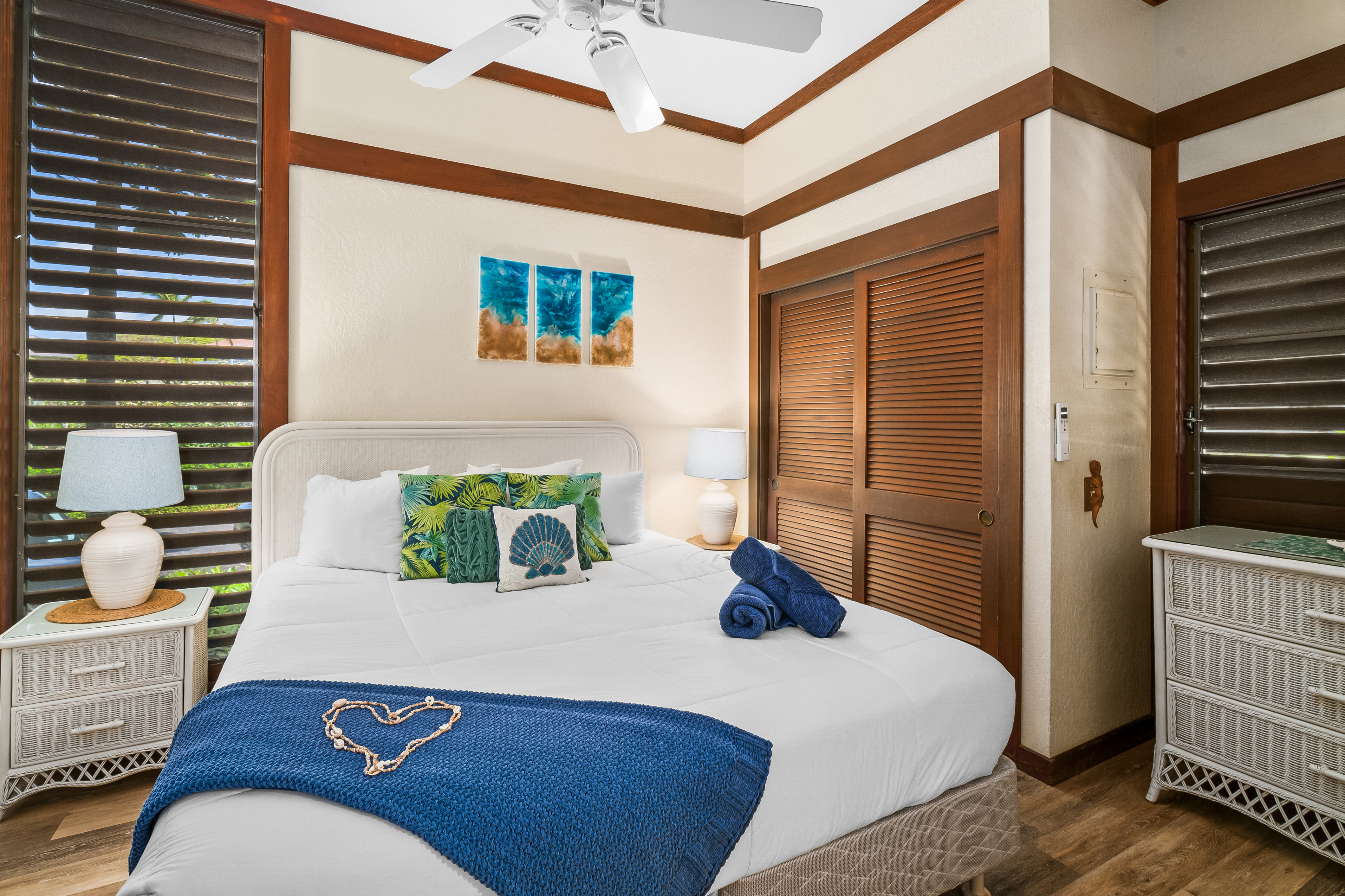 2253 Poipu Road, Unit 169 Koloa, HI 96756 - Photo 2 of 13 a bedroom with a bed and a dresser