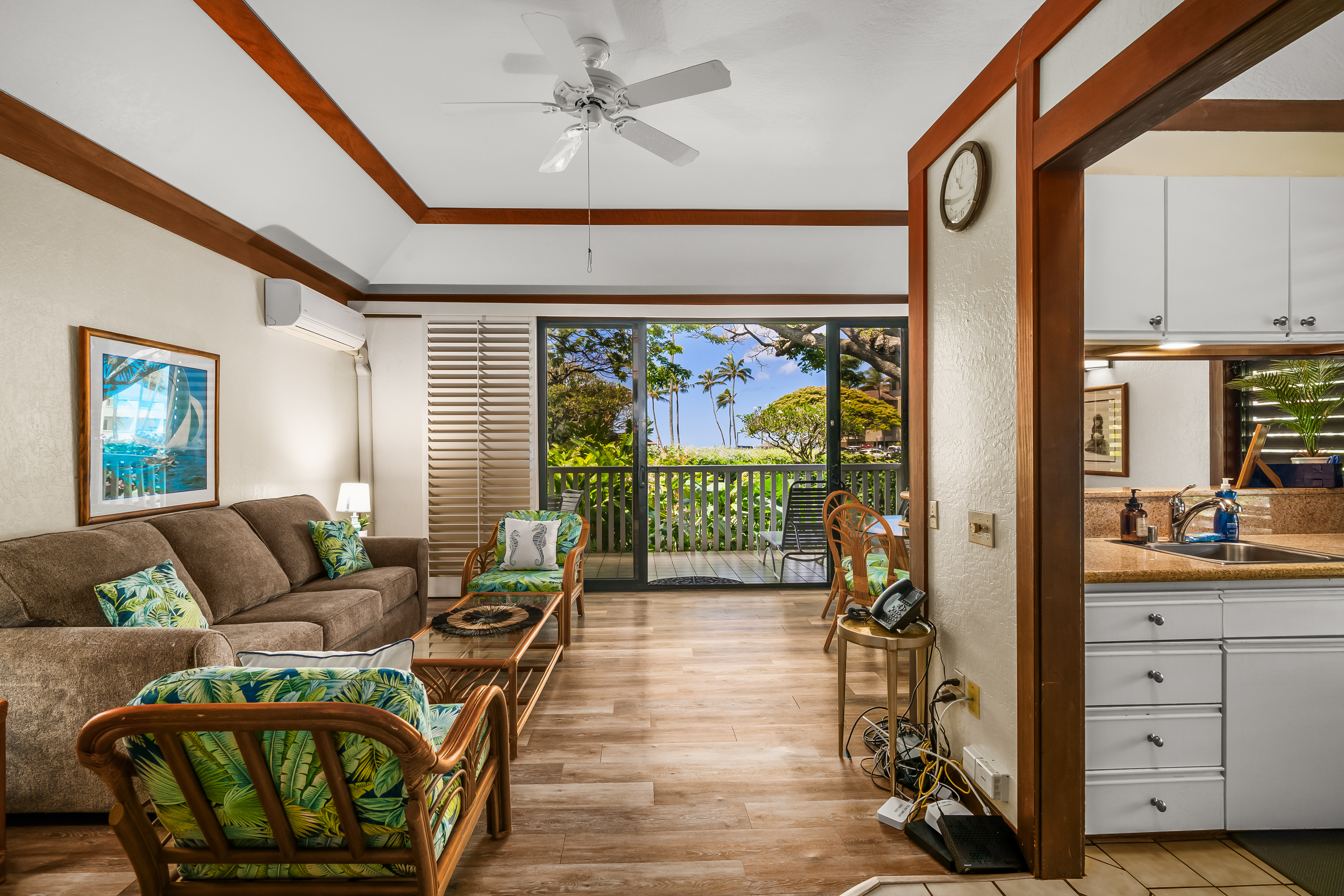 2253 Poipu Road, Unit 169 Koloa, HI 96756 - Photo 5 of 13 a living room with furniture and a large window
