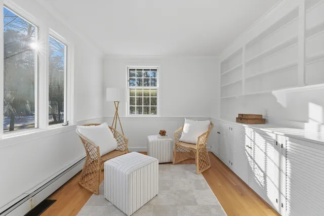 a room with furniture and windows