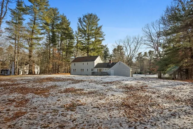 a house with trees in front of it