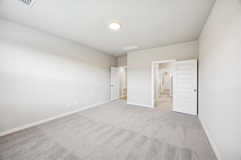 8349 Kingfisher Road Pilot Point, TX 76258 - Photo 21 of 37 Primary Suite in the Willow home plan by Trophy Signature Homes – REPRESENTATIVE PHOTO