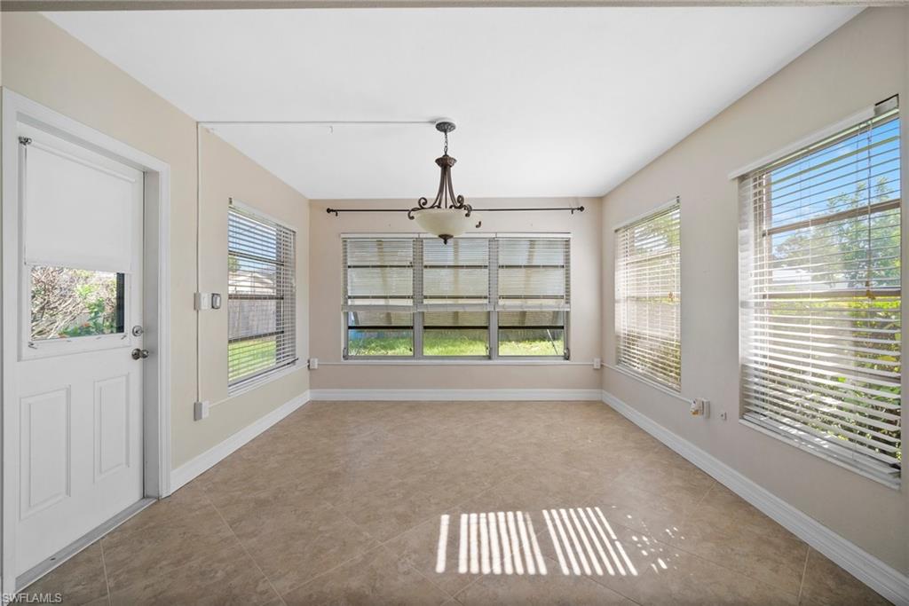 1449 Charles Road Fort Myers, FL 33919 - Photo 14 of 40 View of unfurnished sunroom