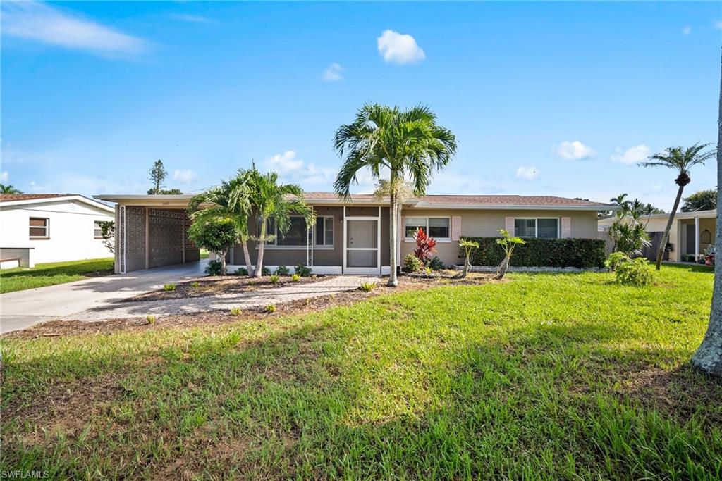 1449 Charles Road Fort Myers, FL 33919 - Photo 3 of 40 Ranch-style home featuring a front yard