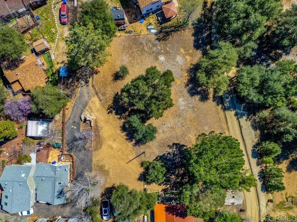 an aerial view of residential house with outdoor space