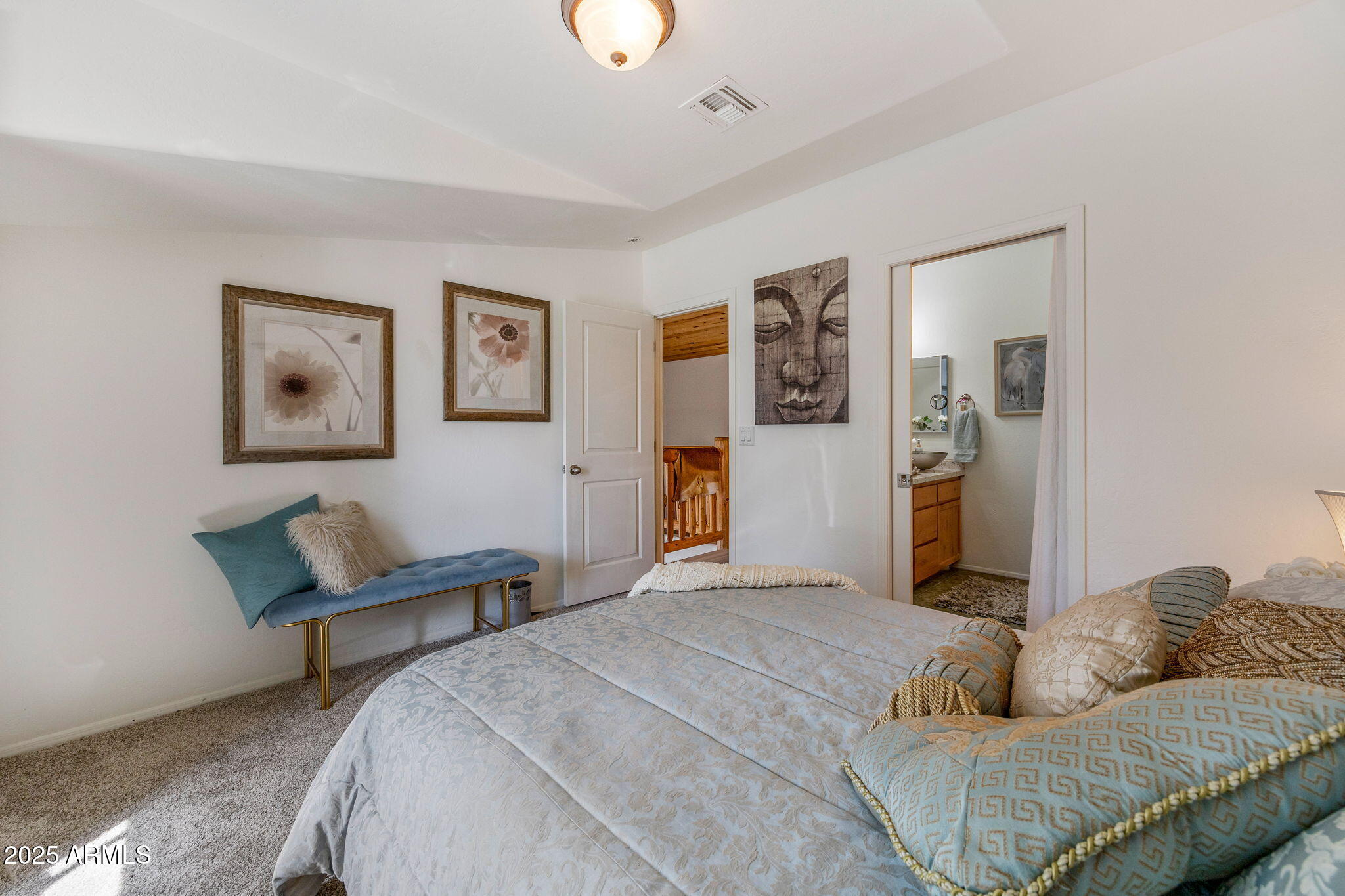 6935 Starlight Ridge Road Lakeside, AZ 85929 - Photo 16 of 32 a bedroom with a bed and dresser