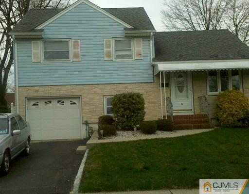 6 Wilshire Road Edison, NJ 08817 - Photo 2 of 2 a view of a house with a garden