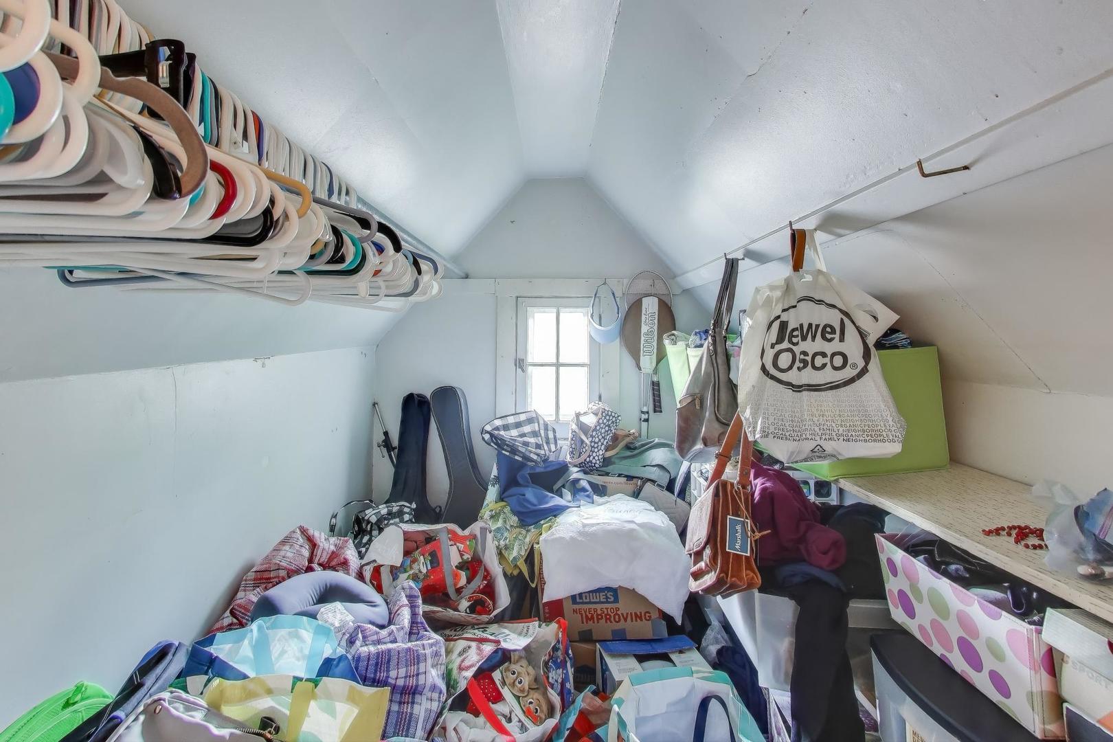 2859 North Mango Avenue Chicago, IL 60634 - Photo 15 of 24 a living room with lots of furniture and baby toys