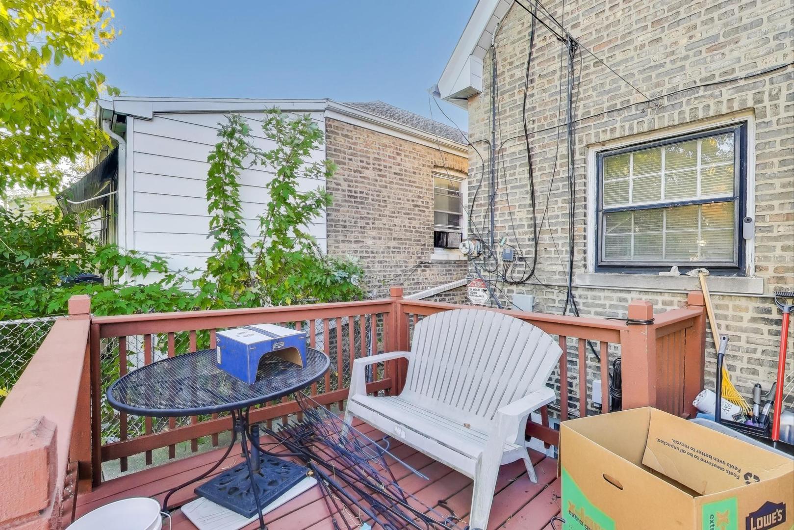 2859 North Mango Avenue Chicago, IL 60634 - Photo 22 of 24 a view of an outdoor sitting area with a couch