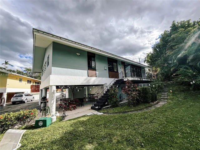 a view of bathroom with dual sinks