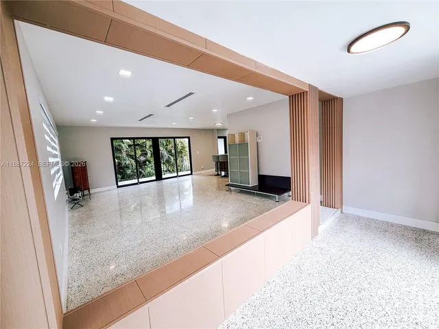 a bathroom with a tub and shower