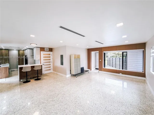 a view of swimming pool with a patio and a yard