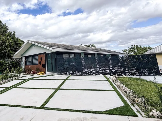 front view of house with a yard