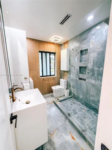 a bathroom with a sink and a shower