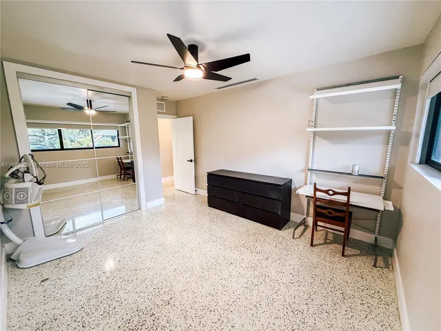 a view of swimming pool with a yard