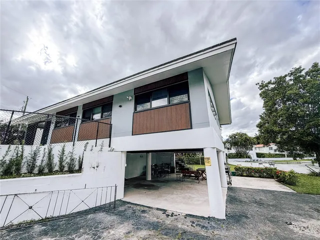 a front view of house with yard
