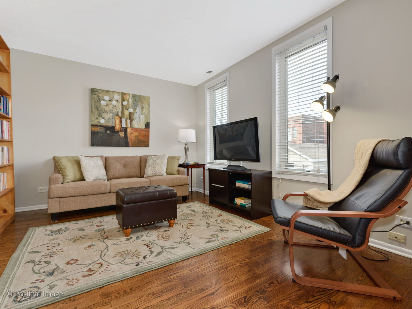 1920 North Mohawk Street, Unit 17 Chicago, IL 60614 - Photo 13 of 28 a living room with furniture and a flat screen tv
