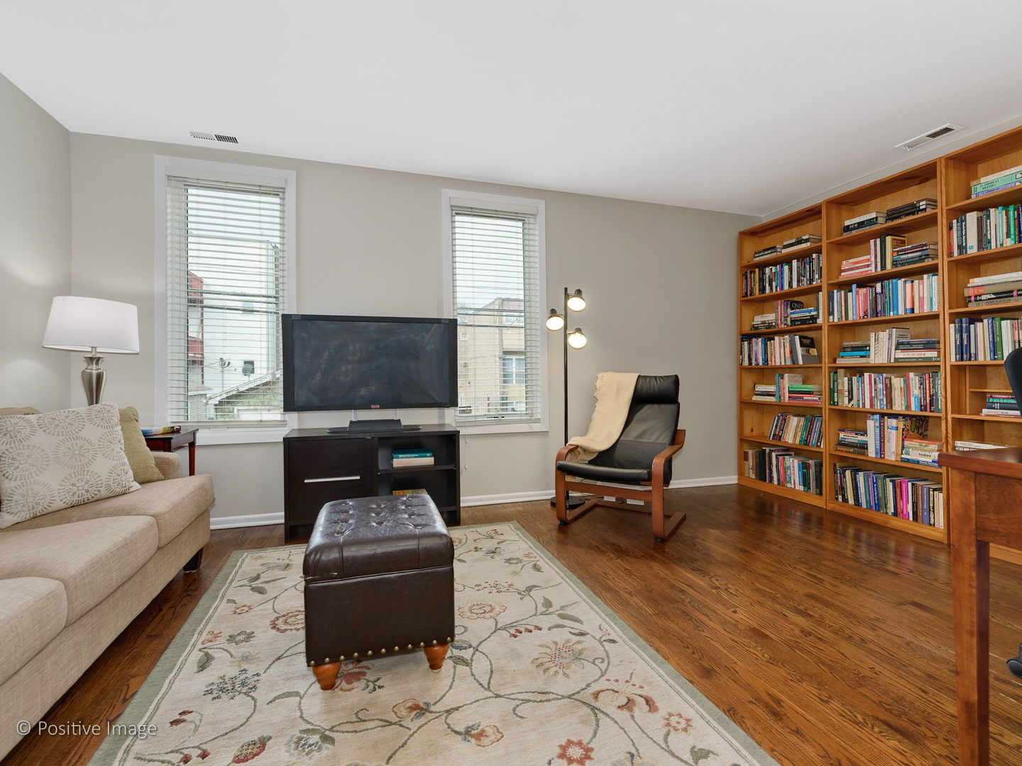 1920 North Mohawk Street, Unit 17 Chicago, IL 60614 - Photo 15 of 28 a living room with furniture and a flat screen tv