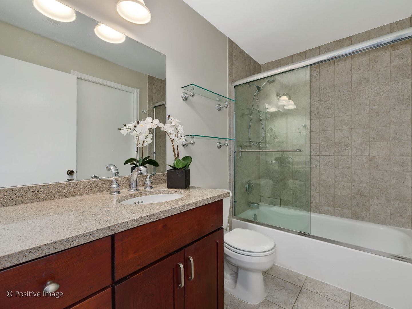 1920 North Mohawk Street, Unit 17 Chicago, IL 60614 - Photo 18 of 28 a bathroom with a sink a toilet and shower