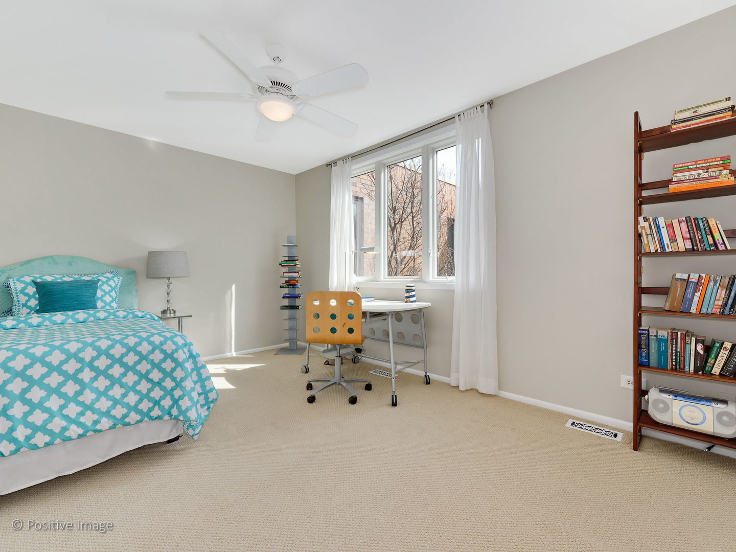 1920 North Mohawk Street, Unit 17 Chicago, IL 60614 - Photo 19 of 28 a bedroom with furniture and a book shelf