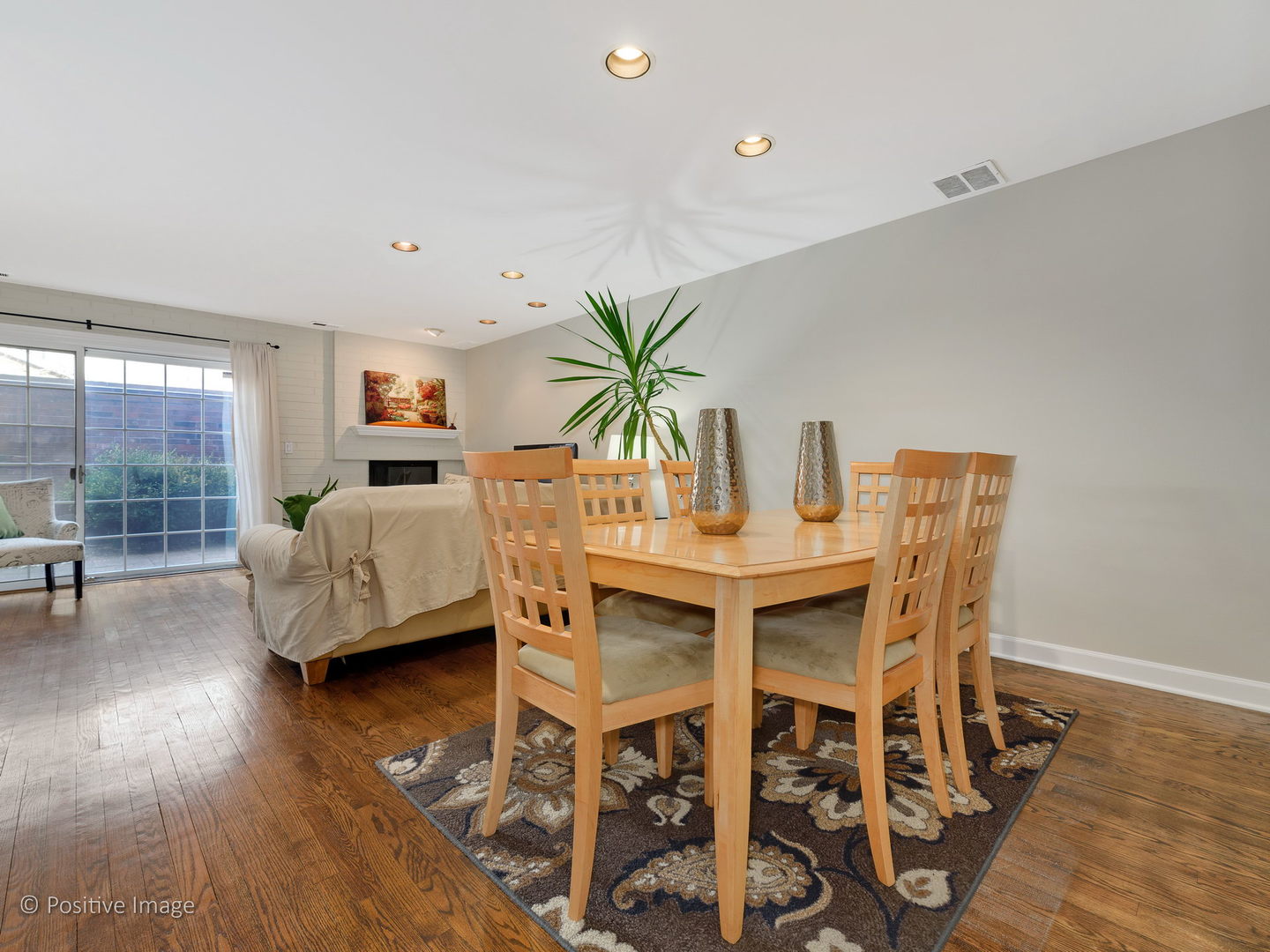 1920 North Mohawk Street, Unit 17 Chicago, IL 60614 - Photo 7 of 28 a dining room with furniture and wooden floor