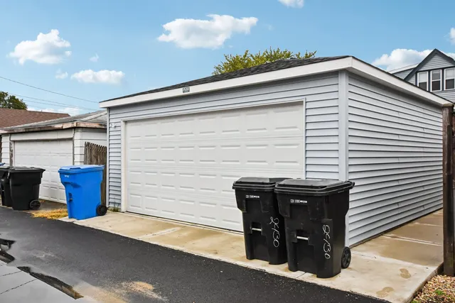 a view of a chair and table in the back