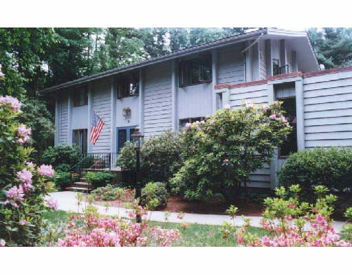9 Sentinel Road Hingham, MA 02043 - Photo 1 of 1 a front view of a house with a yard