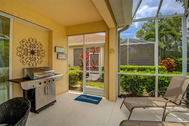 a view of a patio with swimming pool