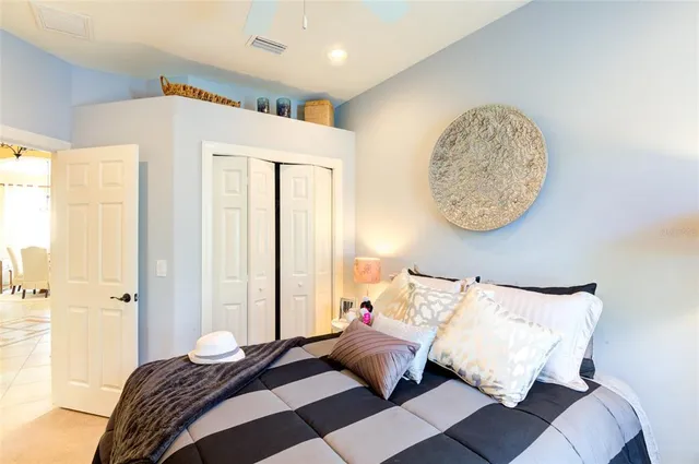 a bathroom with a sink vanity mirror and toilet