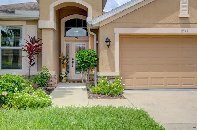 a house view with a garden space