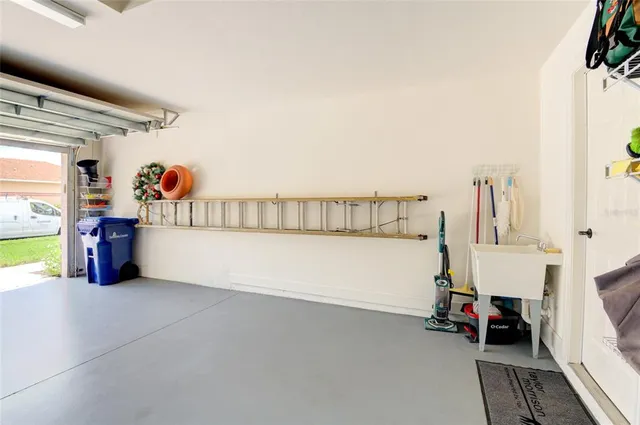 a view of swimming pool with outdoor seating and plants