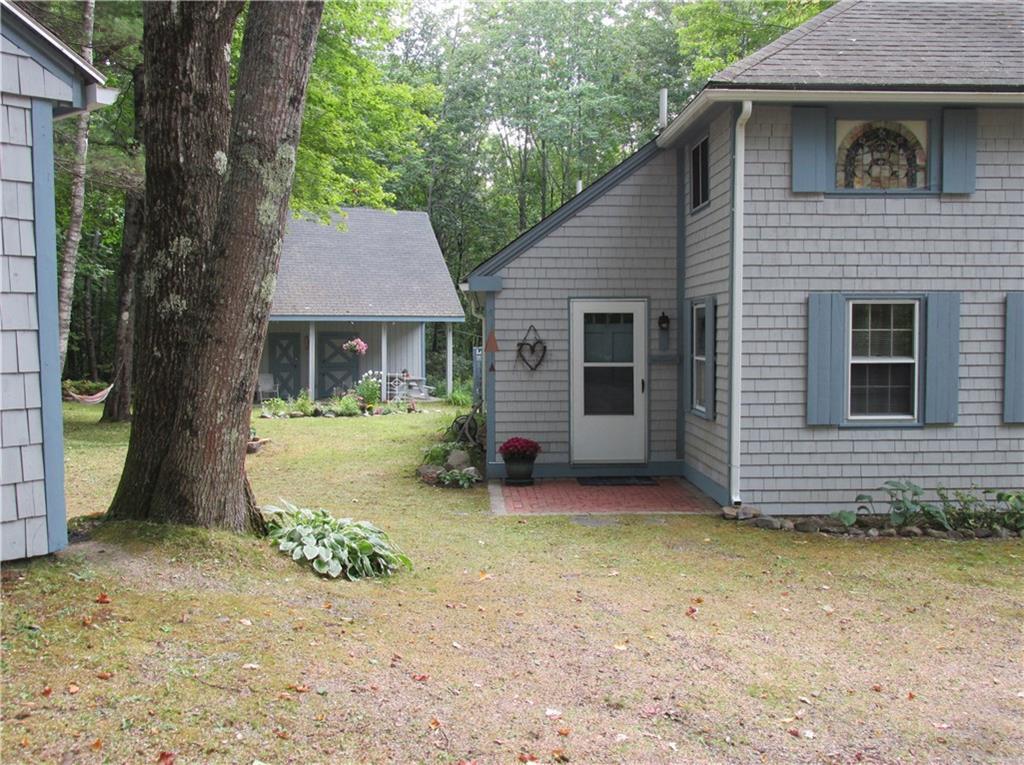 881 Oak Hill Road Swanville, ME 04915 - Photo 1 of 23 View from drive. The stained glass...