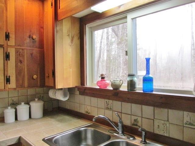 881 Oak Hill Road Swanville, ME 04915 - Photo 11 of 23 Kitchen view of winter landscape.