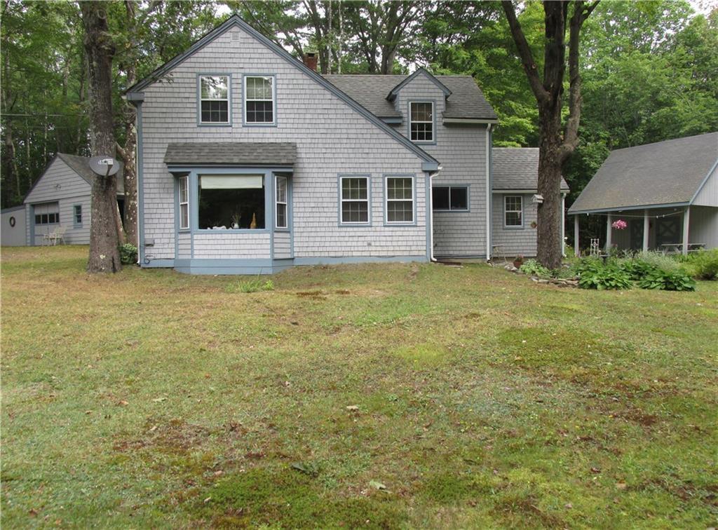 881 Oak Hill Road Swanville, ME 04915 - Photo 2 of 23 View from the side. Living room with...