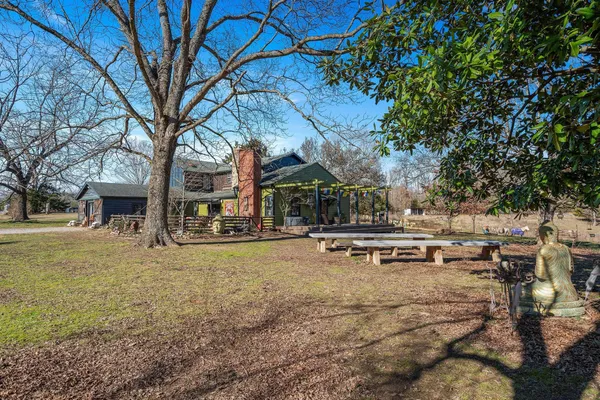 a outdoor living space with furniture and a potted plant