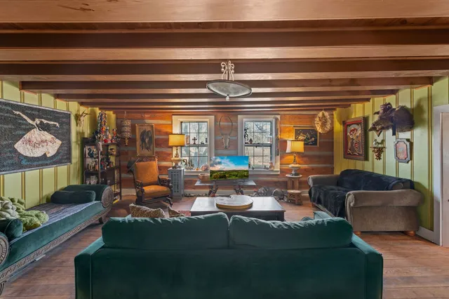 a kitchen with a table and chairs