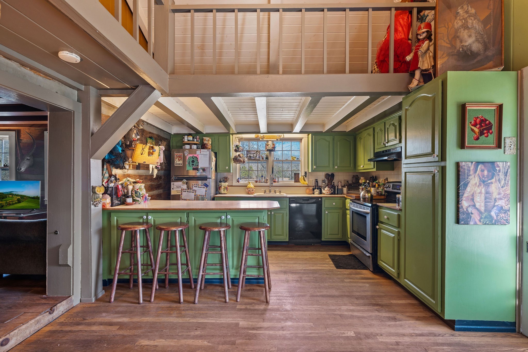 7139 Kingston Road Fairview, TN 37062 - Photo 22 of 43 a kitchen with a table and chairs