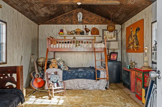 a view of path along with retail shop and buildings