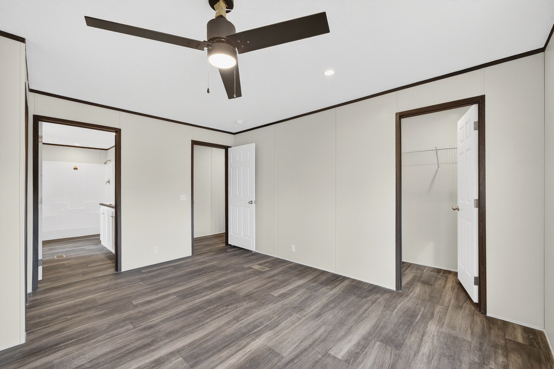 3615 Guys Chewalla Road Ramer, TN 38367 - Photo 30 of 65 a view of an empty room with wooden floor