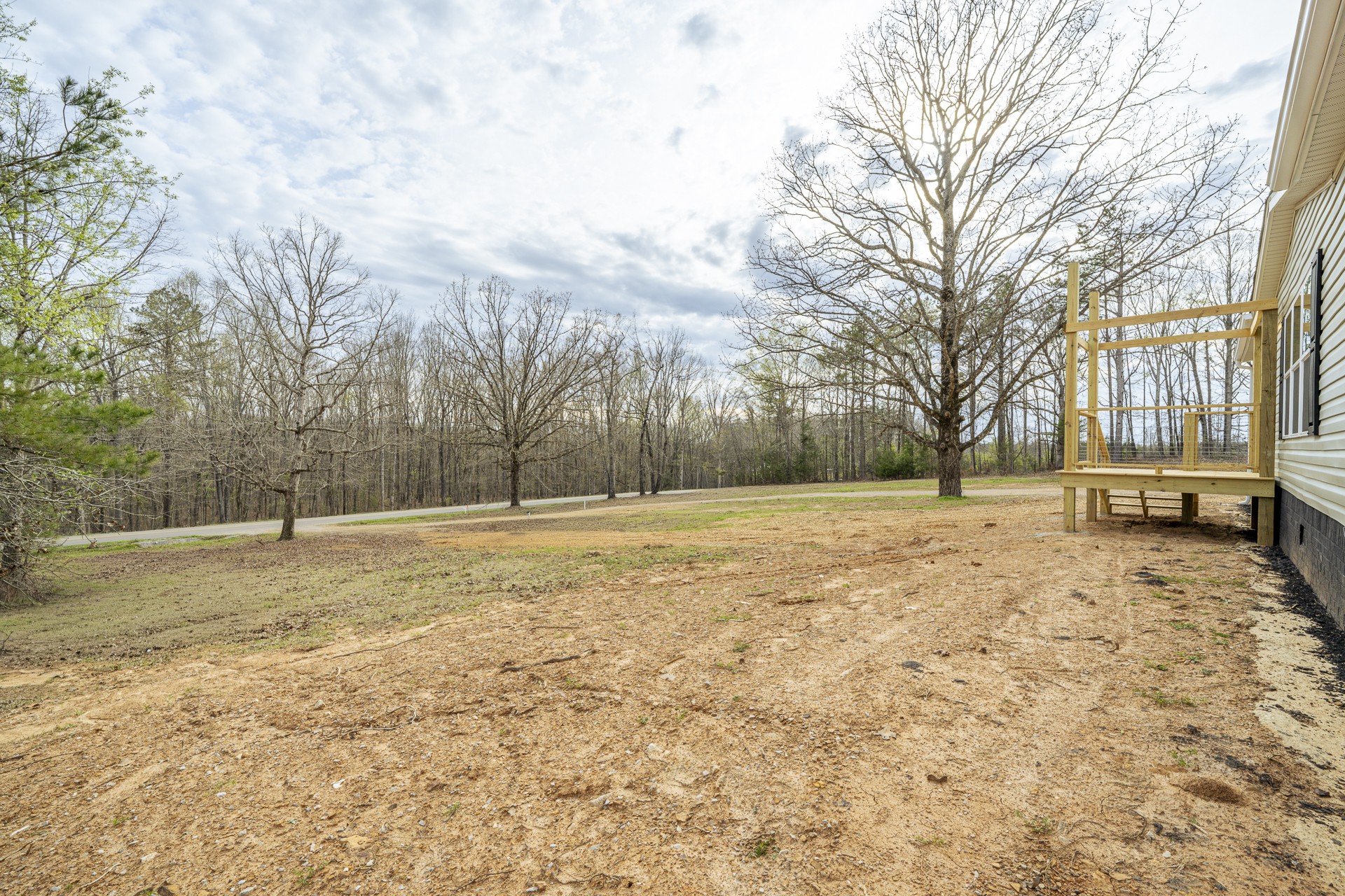 3615 Guys Chewalla Road Ramer, TN 38367 - Photo 43 of 65 a view of yard covered with snow in front of house