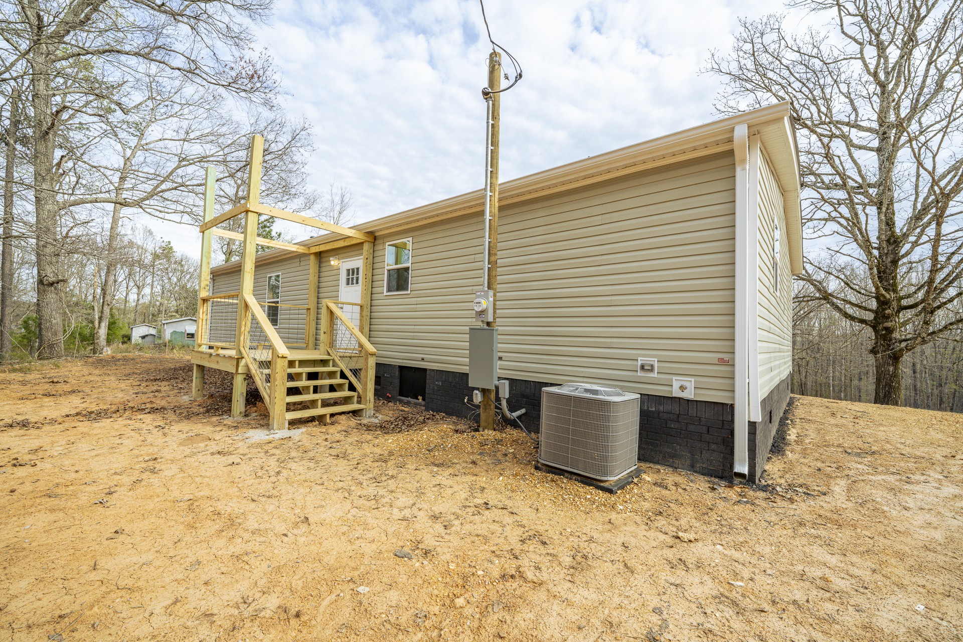 3615 Guys Chewalla Road Ramer, TN 38367 - Photo 48 of 65 a view of a patio with a wooden fence