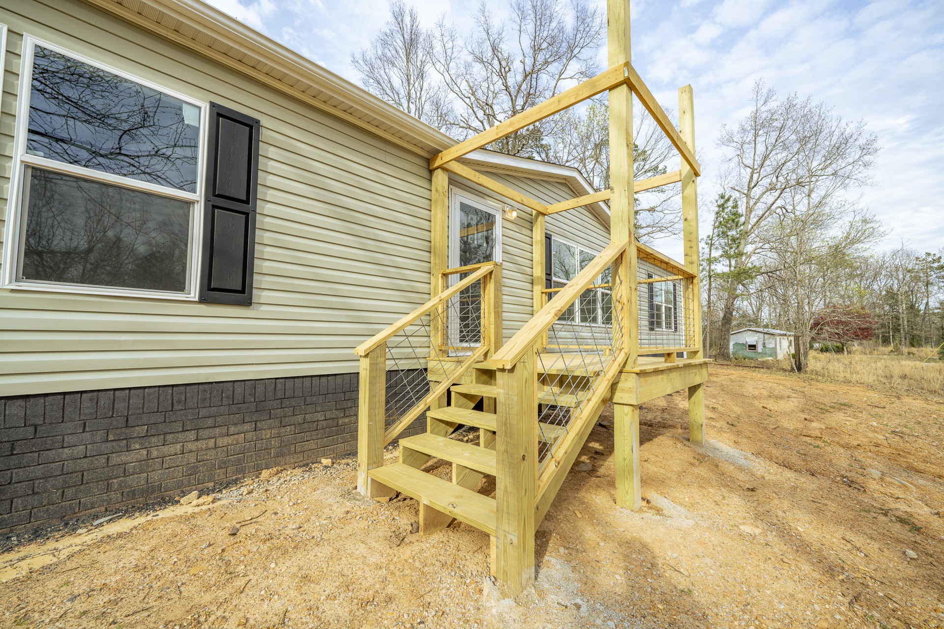 3615 Guys Chewalla Road Ramer, TN 38367 - Photo 54 of 65 a view of a house with a snow on the wall