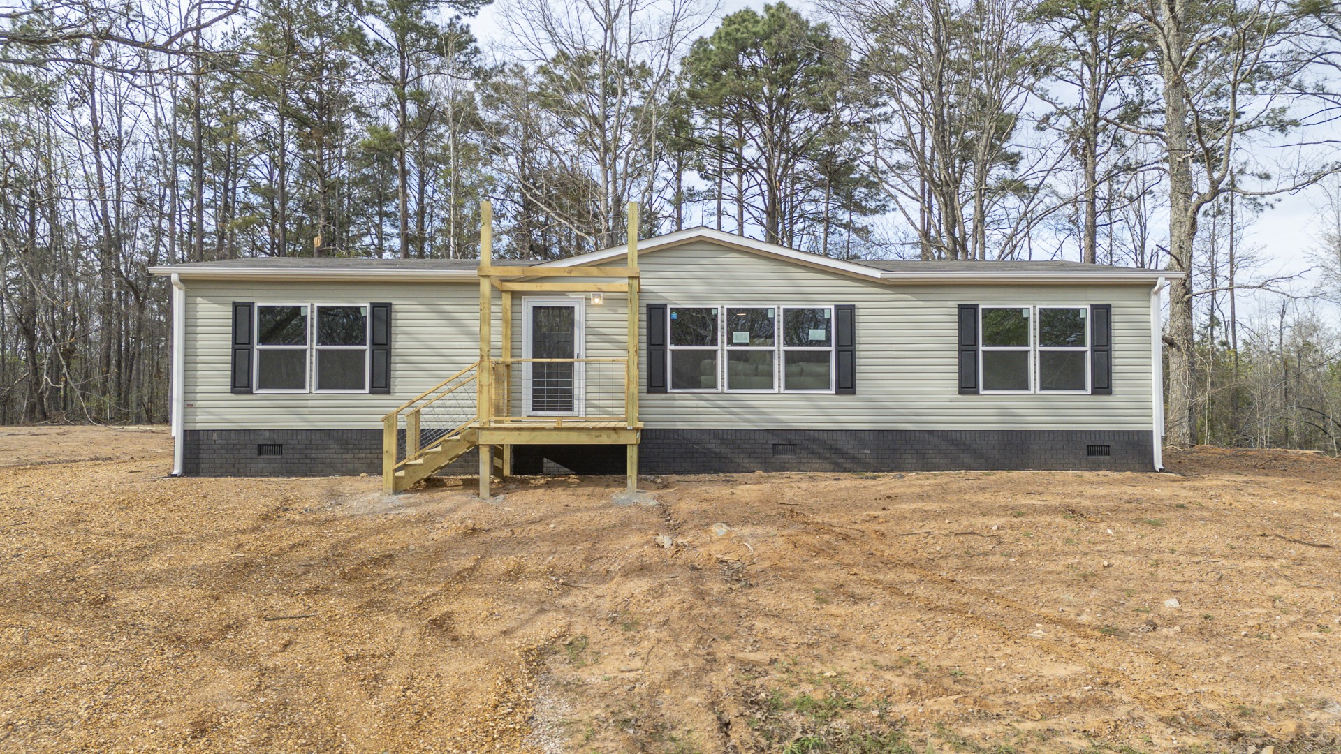 3615 Guys Chewalla Road Ramer, TN 38367 - Photo 60 of 65 a front view of a house with a yard