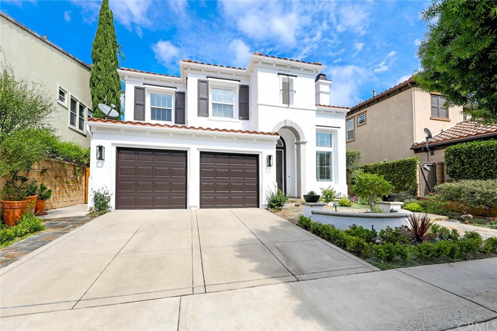 39 Whitehall Newport Beach, CA 92660 - Photo 2 of 35 front view of a house with a yard