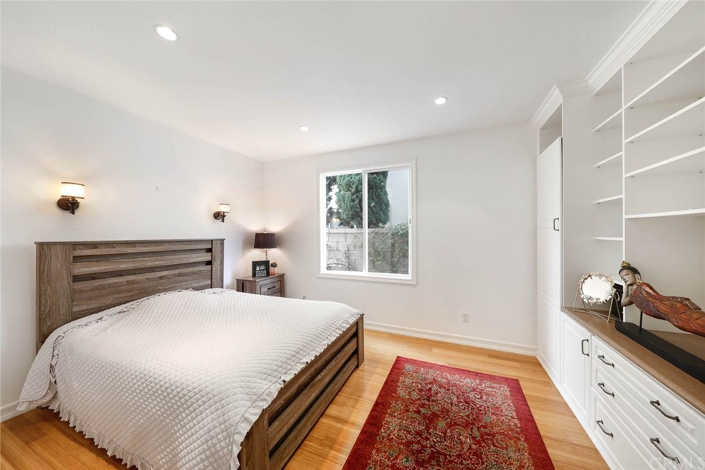 39 Whitehall Newport Beach, CA 92660 - Photo 13 of 35 a bed room with a bed and a window